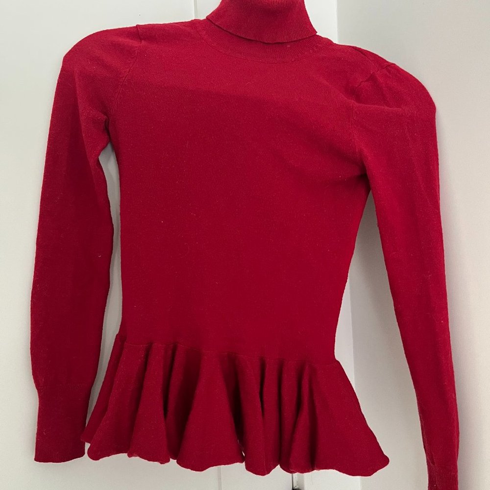 Tularosa: Peplum Turtleneck